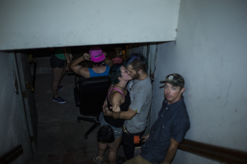 Two hooligans playing tonsil hockey in the hallways. Chase seems frightened.